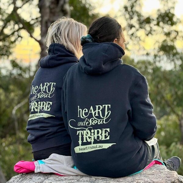 Heart and Soul Tribe Hoodie - sitting on pride rock in sunset